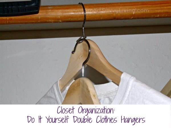 DIY double clothes hangers hanging on a wooden closet rod